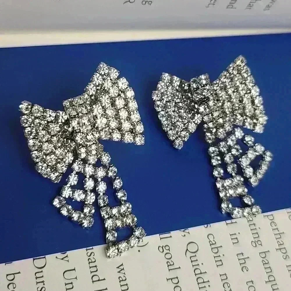 Silver tone clear rhinestones bow earrings - Picture 8 of 17